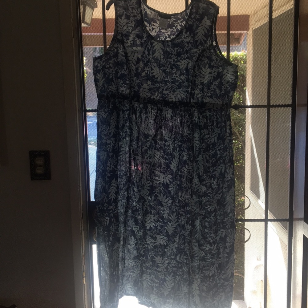 A-Line fit style dress. Blue and white leaves.
